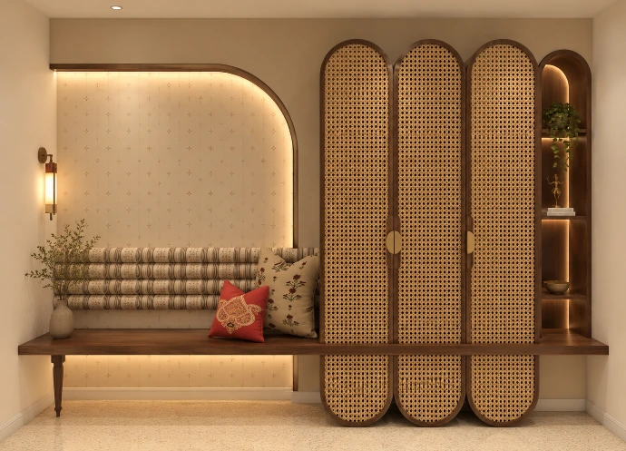 Elegant living room interior with arched feature wall and decorative partition by Kalakaar Homes