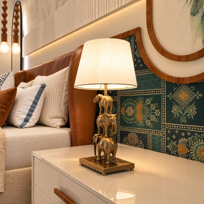 Elegant bedroom interior with warm lighting designed by Kalakaar Homes